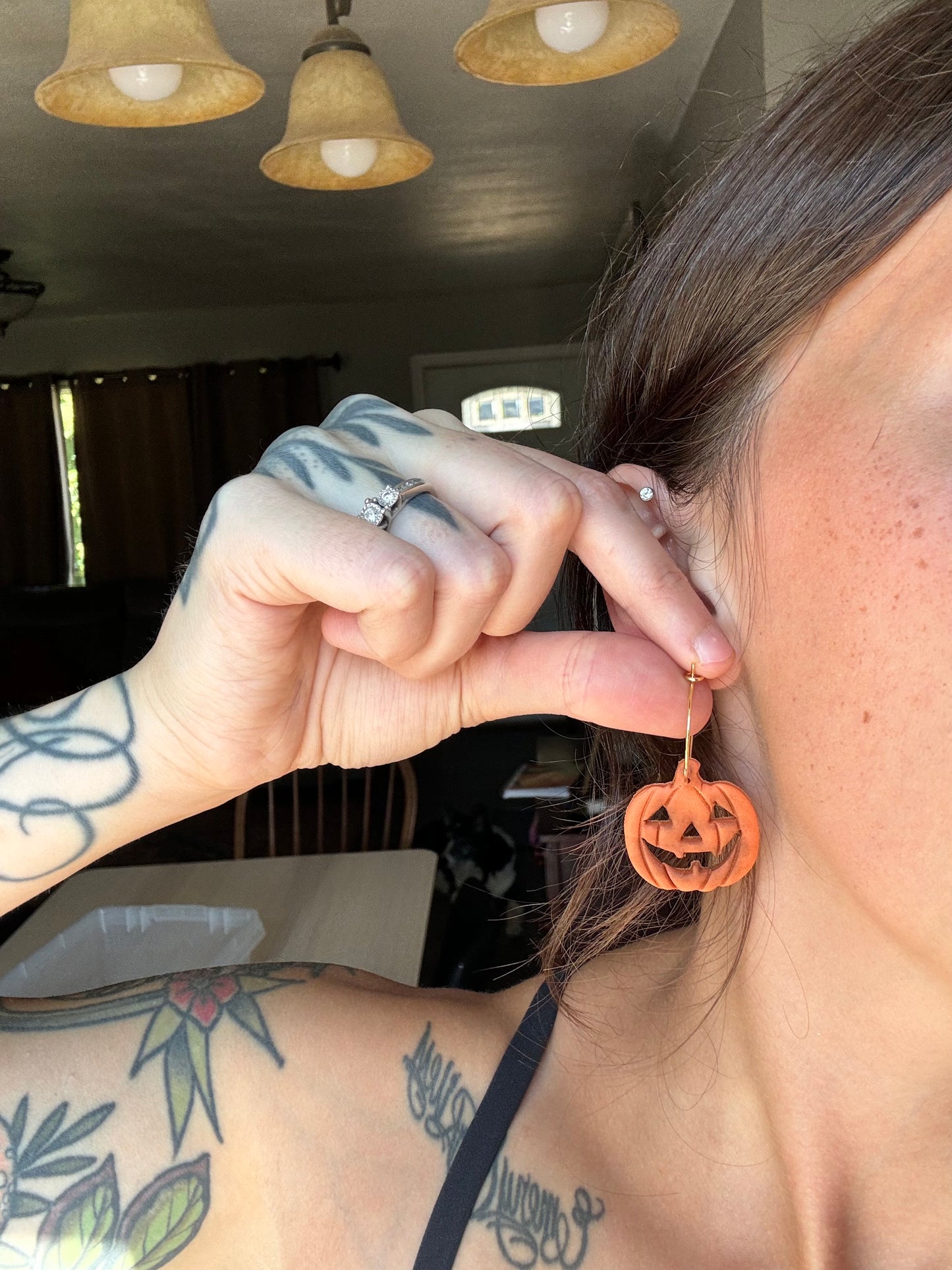 Rotten carved pumpkin dangles