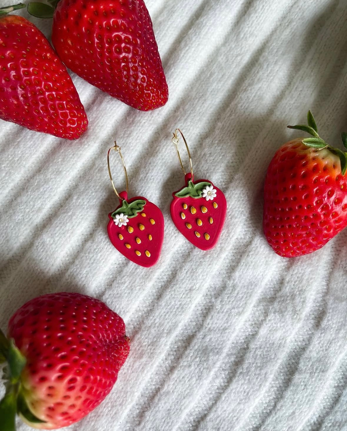 Strawberry’s on a gold hoop