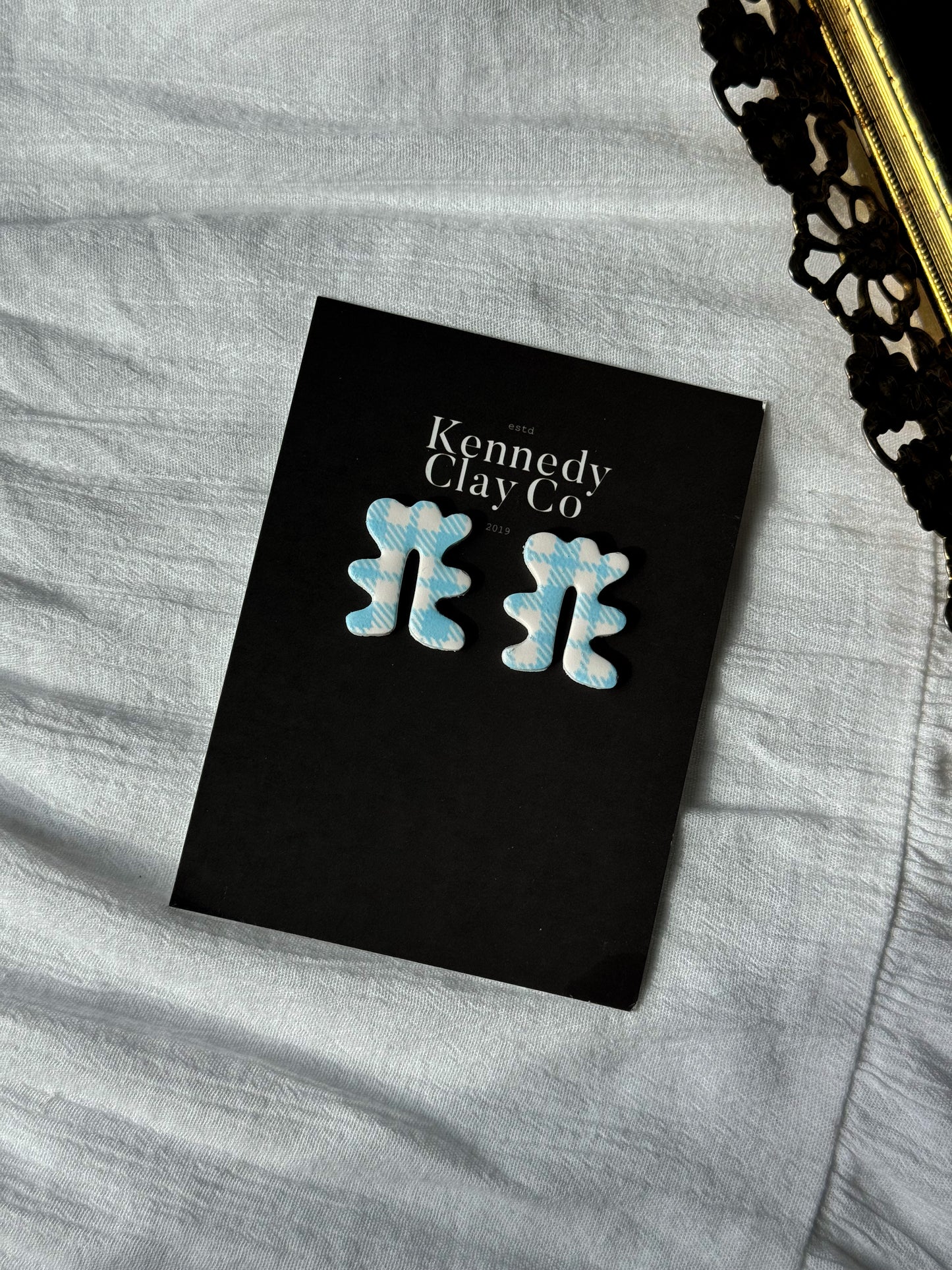 Baby blue gingham studs