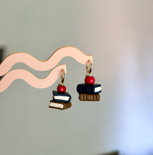 Apple on a stack of books