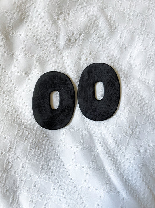 Distressed oversized studs