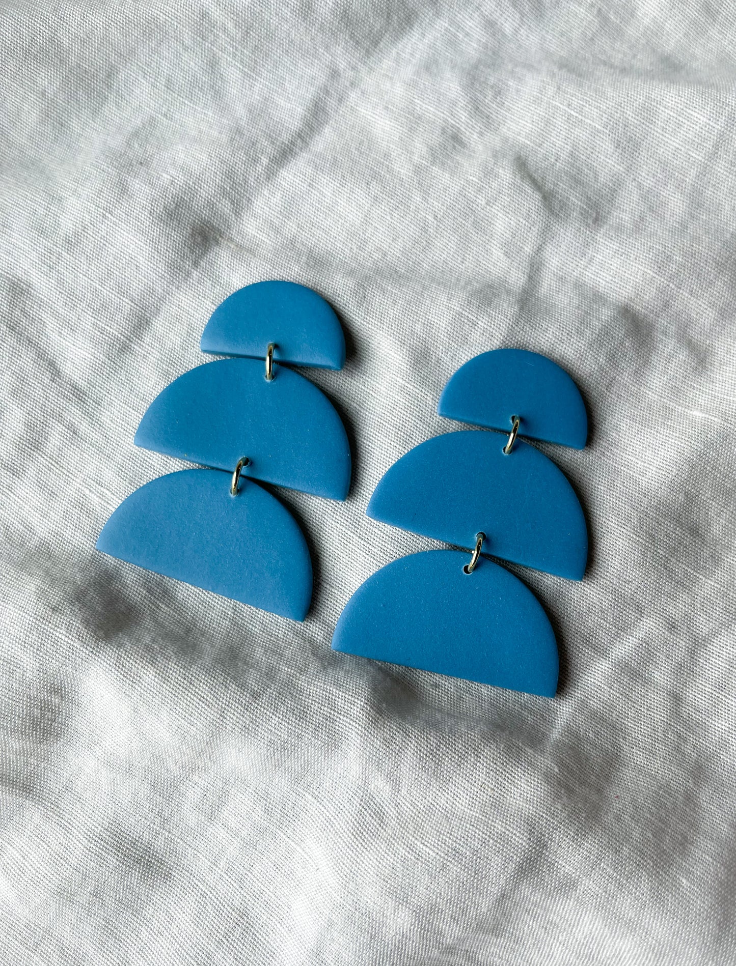 Something blue dangles